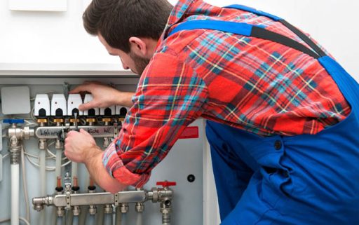Technician servicing the underfloor heating
